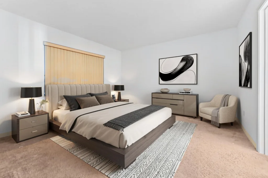 20261008162242109835000000-o - Lake Worth Homes - Lake Worth Homes Modern bedroom with a large upholstered platform bed, two nightstands with lamps, and a beige and gray color scheme.