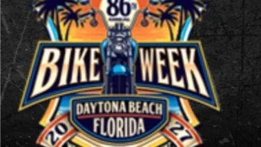 Bike Week Daytona Beach Florida logo featuring a motorcycle, palm trees, and bold text on an orange backdrop.